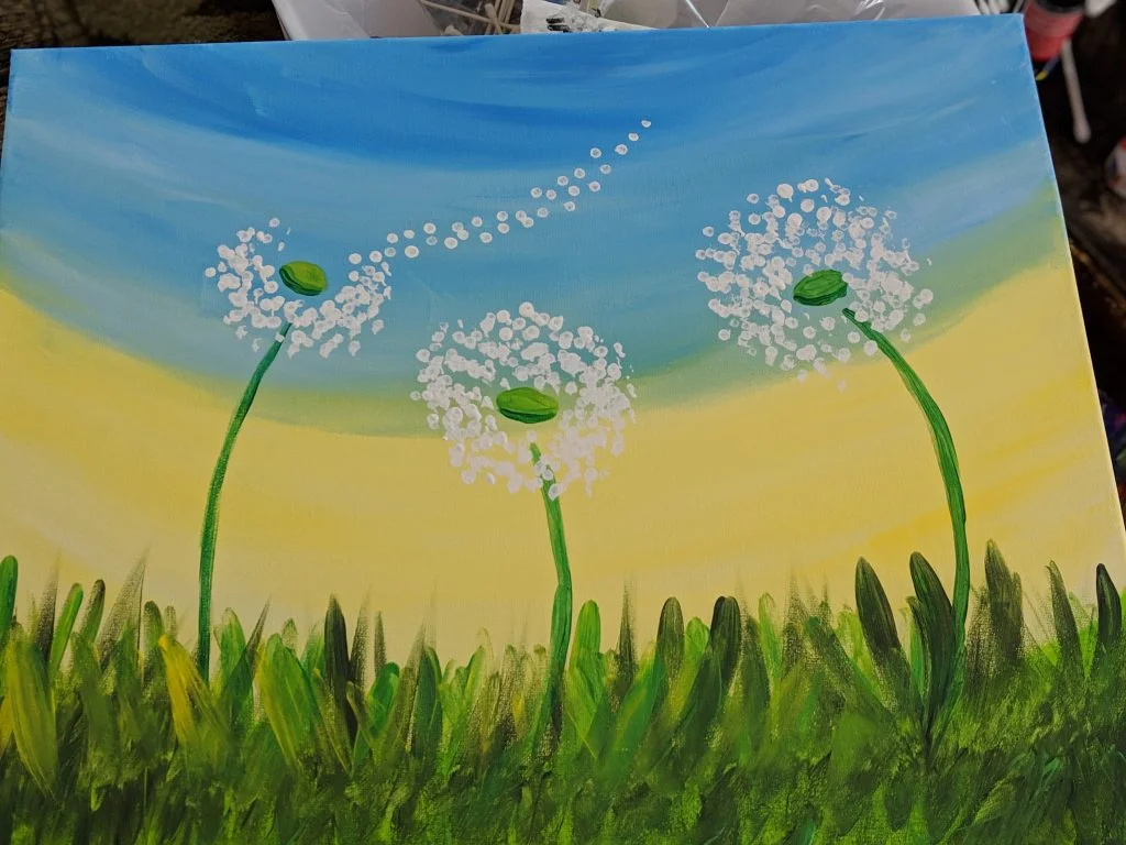 painting of dandelions - blowy flowers - on a canvas that I painted on date night.