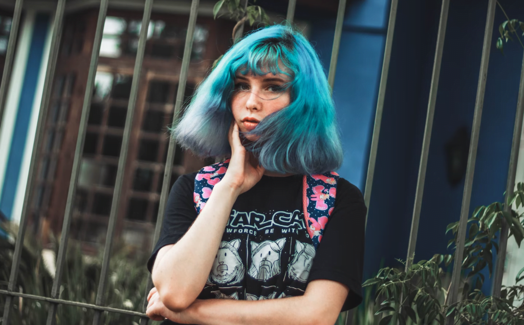 girl with blue hair wearing Star Wars Cat tee