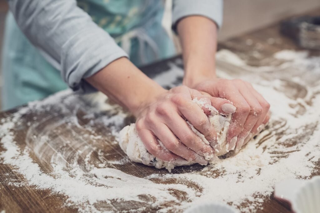 Bake-Off Challenge hands kneasding dough