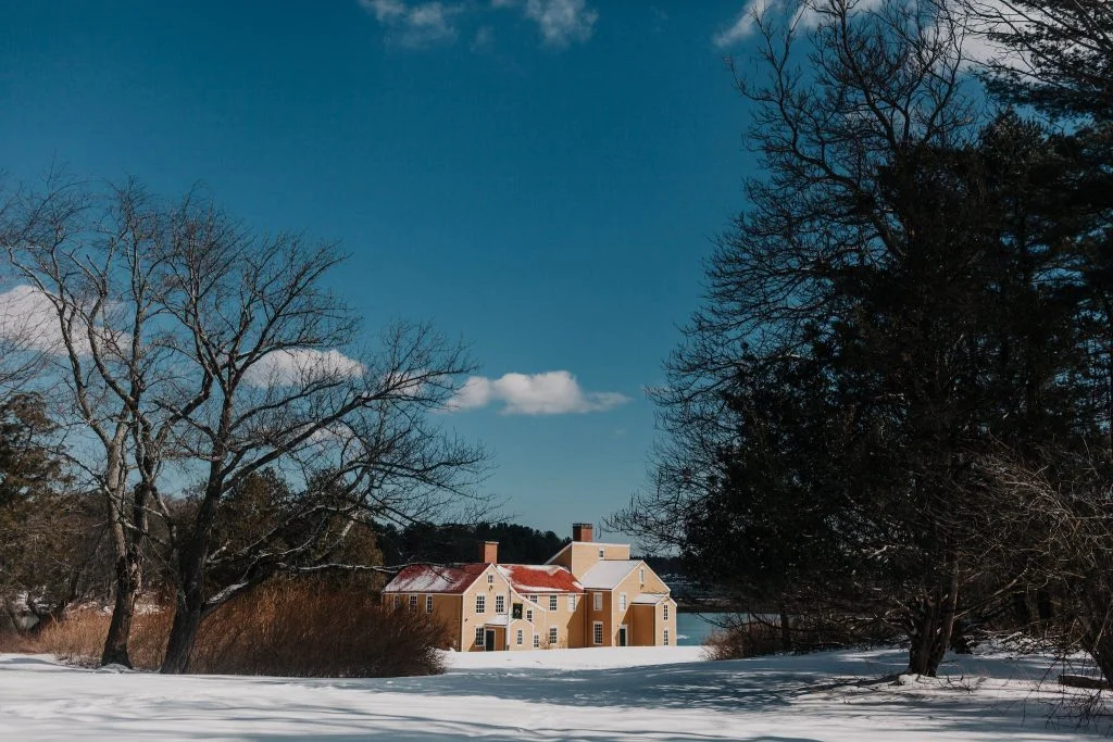 Landscape Photography of House Under Calm Blue Sky