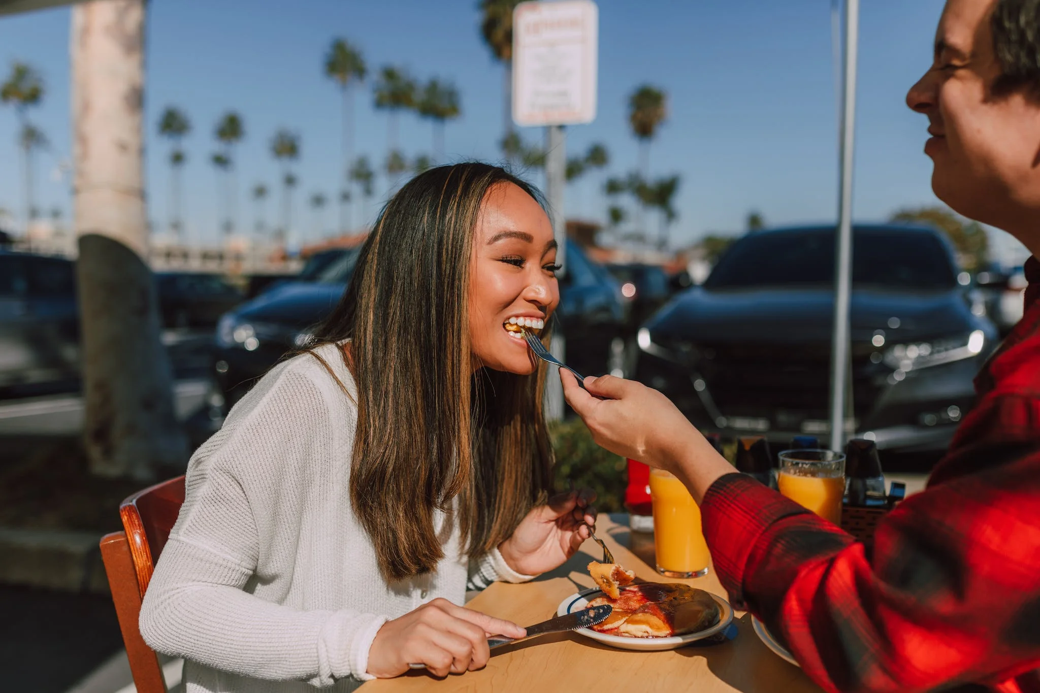 Couple Eating Pancakes in a breakfast date