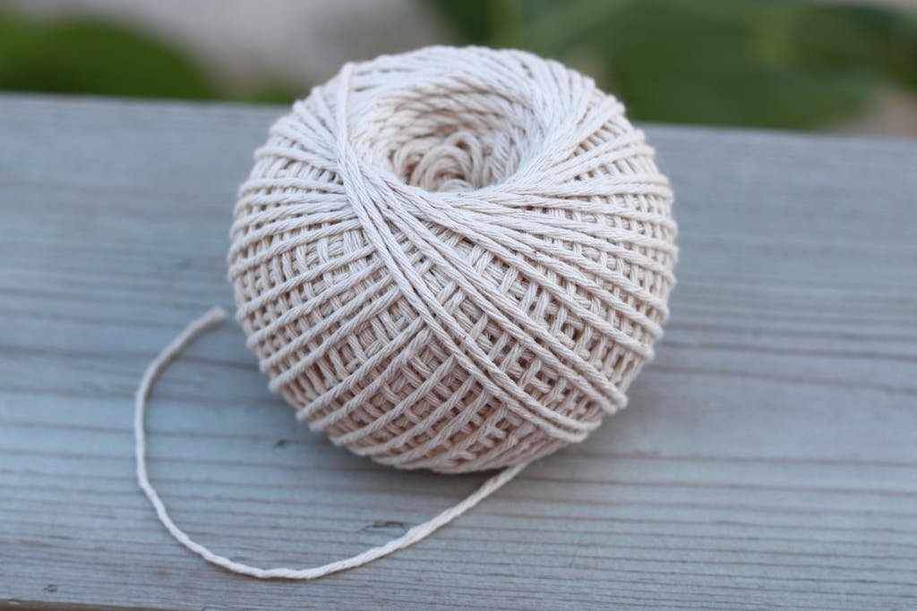 Ball of Yarn on Wooden Surface