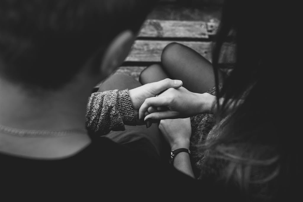 Close-up of Couple Holding Hands and why compromise is important in conflict resolution