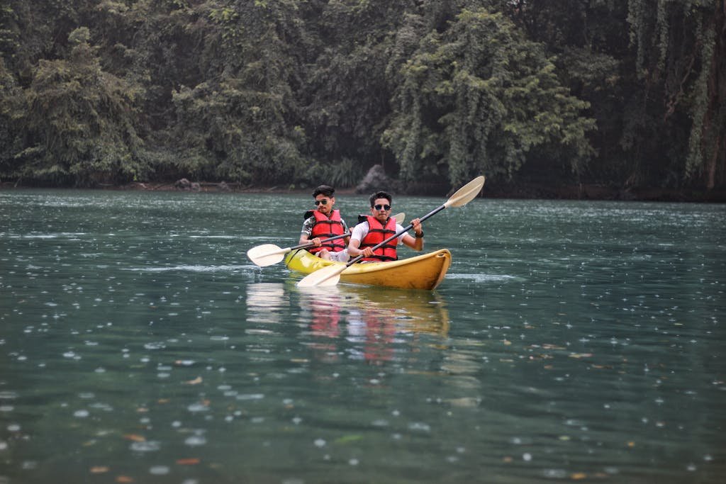 Photo of Two People in Kayak