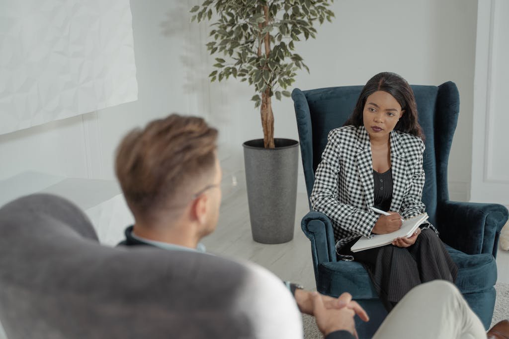 A Psychologist Listening to her Patient