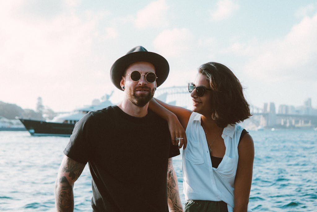 Photo of Man and Woman Near Ocean