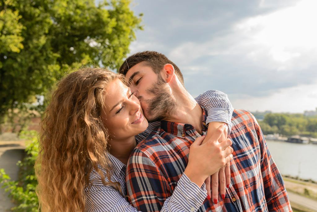 Man Kissing Woman in communication skills for couples