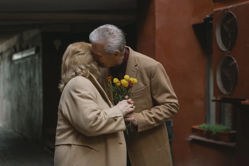 A Man Kissing a Woman