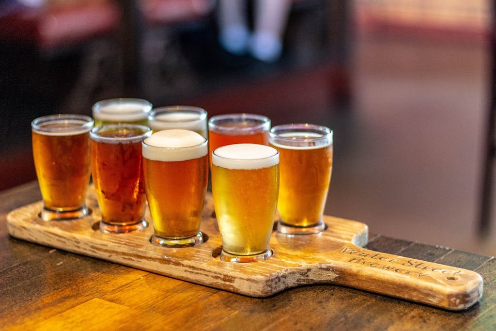 A selection of craft beers on a board at a Milwaukee pub.