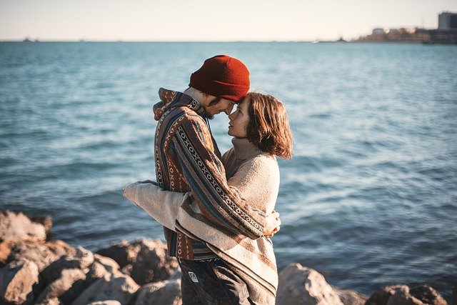 Monthly Date Night Rituals To Boost Your Relationship 7 couple by the beach